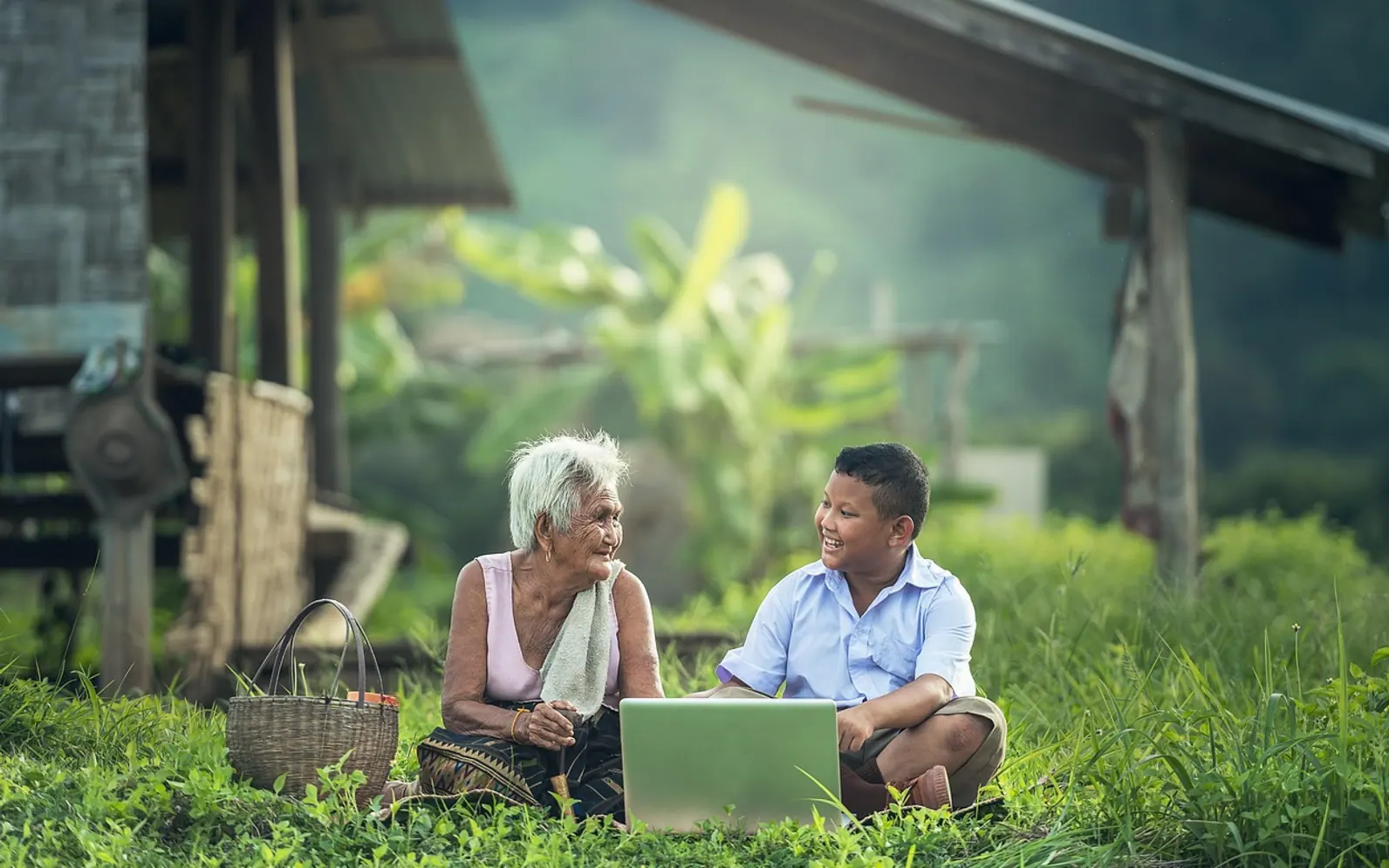 Grandmother, kids and laptop