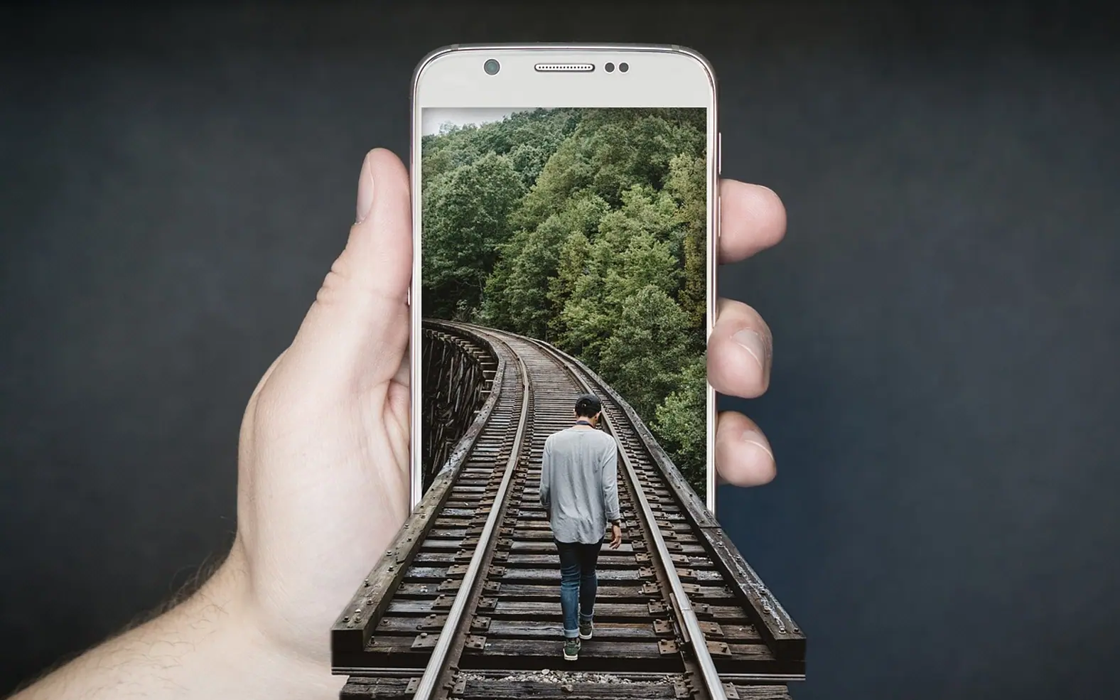 Train track, railroad and smartphone